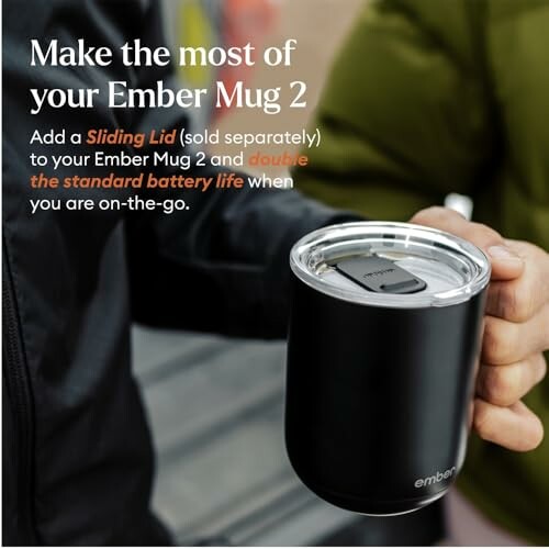 Person holding Ember Mug 2 with sliding lid