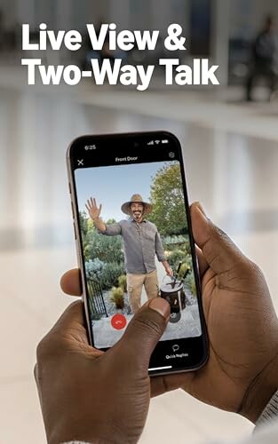 Person holding phone showing live view and two-way talk feature