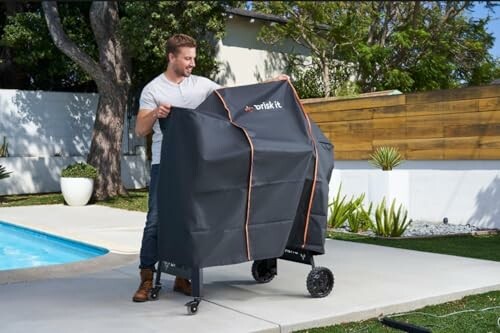 Man placing cover on outdoor grill by a pool.