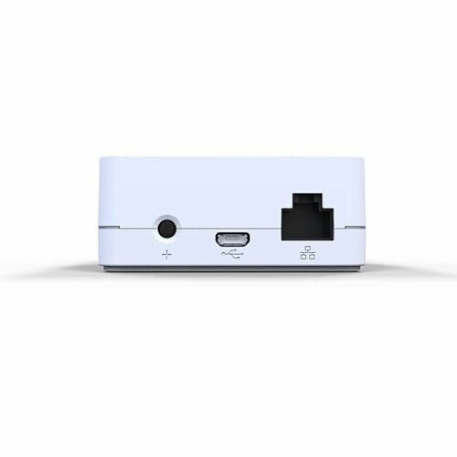 Back panel of a white network device with ports.